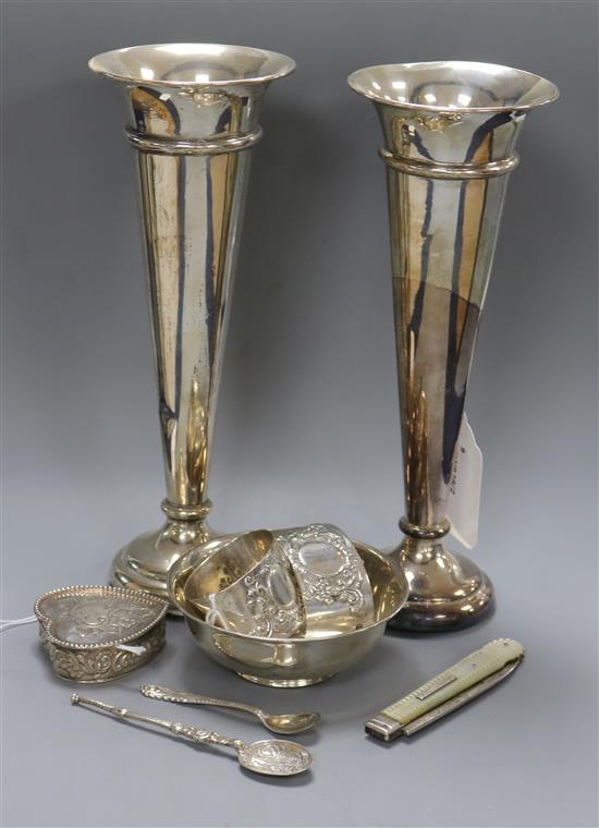 A pair of silver trumpet-shaped specimen vases, London 1912, William Comyns (weighted) and seven other items,